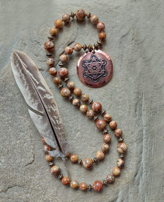 Sacred geometry jewellery with archangel Metatron pendant on a crystal bead necklace