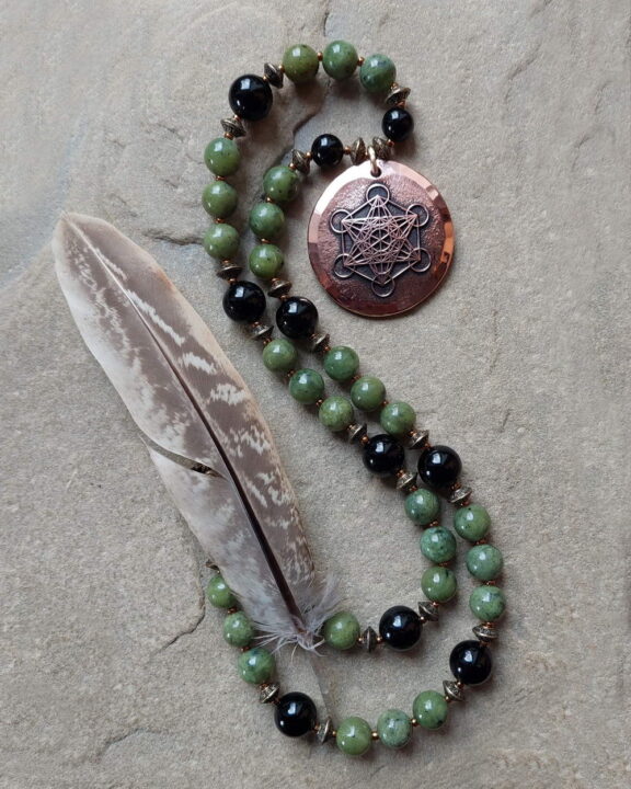 Handmade jewellery made of copper with Metatron pendant on a bead necklace