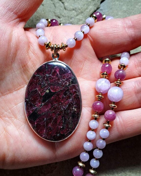 Eudialyte pendant on a crystal necklace - shamanic jewellery