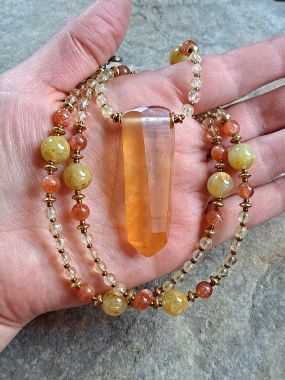 Golden healer crystal pendant on a healing stone necklace - ideal reiki tool